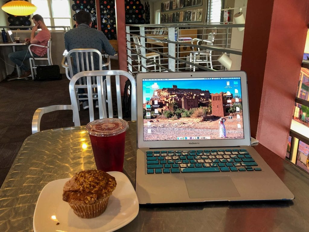 Laptop at a table in LOOP in Tremont